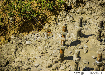 painted lady butterfly (Vanessa cardui)  on concrete construction site 89659661