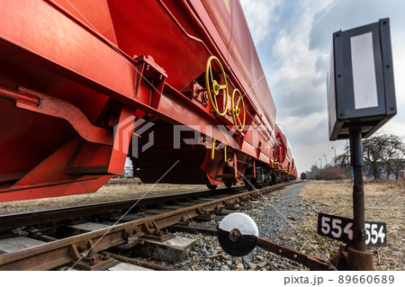 Train wagons carrying freight containers for shipping companies. distribution and freight transport by a railway, transport concept 89660689