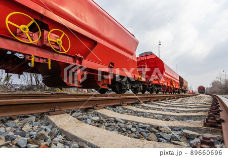 Train wagons carrying freight containers for shipping companies. distribution and freight transport by a railway, transport concept 89660696