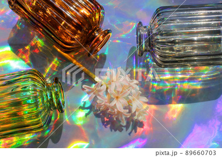 Glassware vases reflect sunlight shadow effect. Play of shadows and sunlight. Glassware vases reflect sunlight shadow effect. Play of shadows and sunlight. 89660703