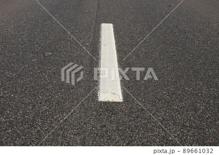 Asphalt road with single solid white line road marking Asphalt road with single solid white line road marking 89661032