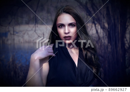 woman vampire gothic look long black hair girl pale skin black lips 89662927