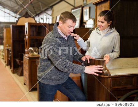 Couple visiting furniture store Couple visiting furniture store 89668905