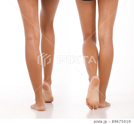 Tanned skin Woman show legs knee foots toe naked as body parts over white background isolated Tanned skin Woman show legs knee foots toe naked as body parts over white background isolated 89675019