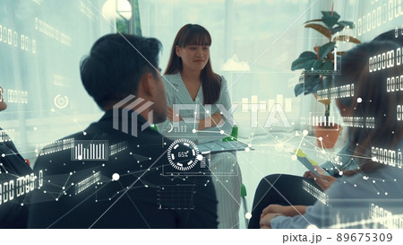 Business people in corporate staff meeting with envisional graphic Business people in corporate staff meeting with envisional graphic 89675309