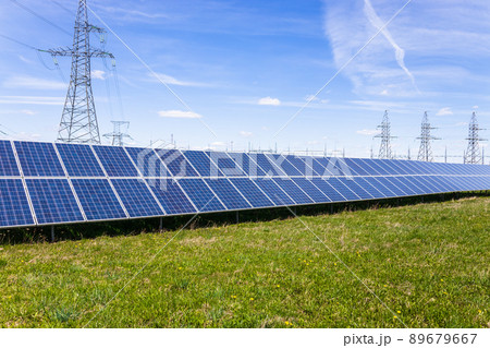 Solar panels, high voltage electricity towers, and transmission power lines 89679667