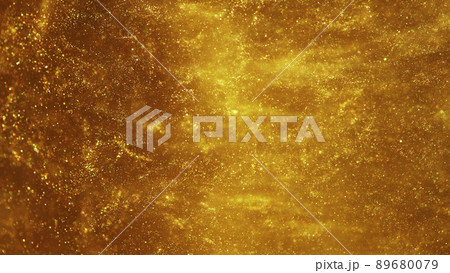 Golden glitters in water, abstract background. Golden glitters in water, abstract background. 89680079
