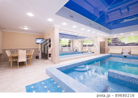 Indoor swimming pool in hotel spa center 89680216