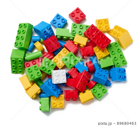 Scattered parts of a plastic children's designer, top view Scattered parts of a plastic children's designer, top view 89680463