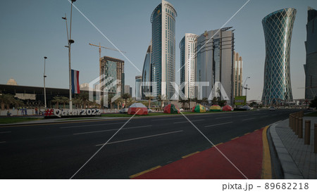 Qatar preparation for FIFA world cup 2022 with  the flags of the participating football teams displayed in Omar AL Mukhtar street in Doha, Qatar  daylight view 89682218
