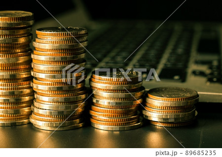 Pile of gold coins stack in finance treasury deposit bank account for saving Pile of gold coins stack in finance treasury deposit bank account for saving 89685235