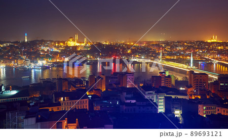 Night lights of Istanbul view from the Galata tower. Retro style. 89693121