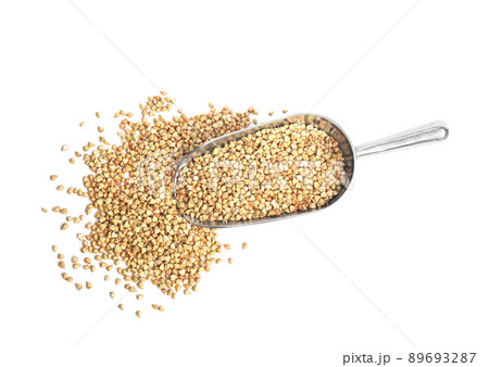 Scoop with green buckwheat isolated on white, top view 89693287