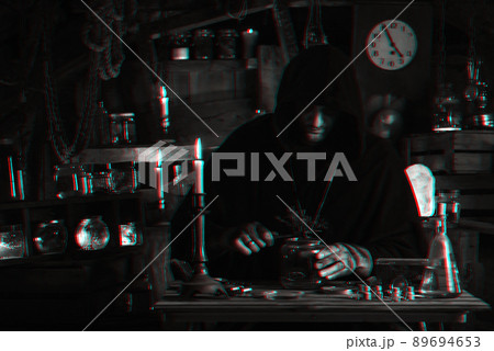 man cosplays a computer game character in the steampunk style. Cyberpunk alchemist concept with 3D glitch effect of virtual reality 89694653