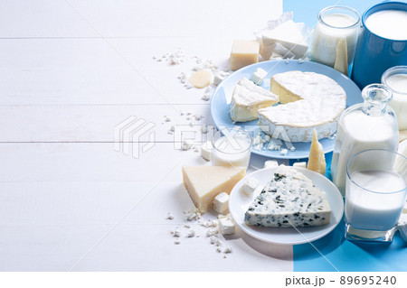 Dairy products on white wood base with copy space. Dairy products on white wood base with copy space. 89695240