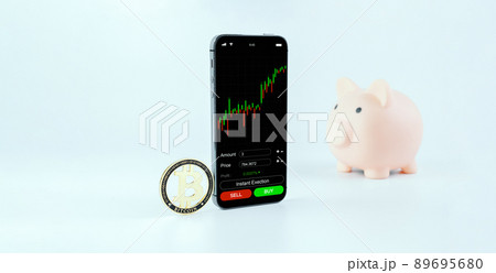 Crypto currency trading. Pink piggy bank, gold crypto currency BTC bitcoin, bitcoin wallet mobile phone application on white background. Save virtual money concept. Crypto currency trading. Pink piggy bank, gold crypto currency BTC bitcoin, bitcoin wallet mobile phone application on white background. Save virtual money concept. 89695680