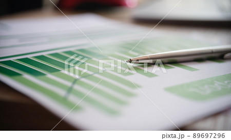 Paper document with pen graphs and diagrams 89697296