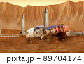 Martian rover drives across the rocky surface, observing the colonists base inside of the crater. 4K footage 89704174