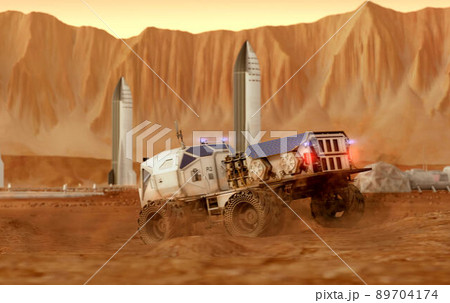 Martian rover drives across the rocky surface, observing the colonists base inside of the crater. 4K footage Martian rover drives across the rocky surface, observing the colonists base inside of the crater. 4K footage 89704174