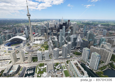 The CN Tower and the Roger centre during the day 89704306
