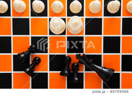 Strategy and business planning concept. Checkmate opponent during chessboard competition. Strategy and business planning concept. Checkmate opponent during chessboard competition. 89709466