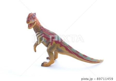 Toy dinosaur on a white background 89711459