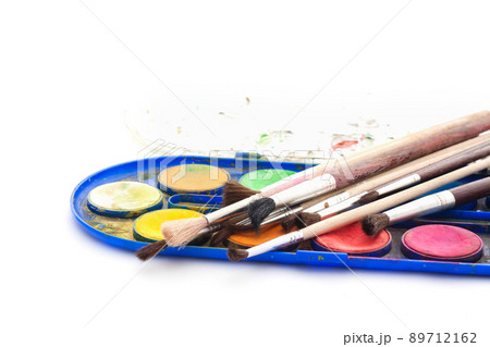 Set of watercolor paints with brushes on white background 89712162