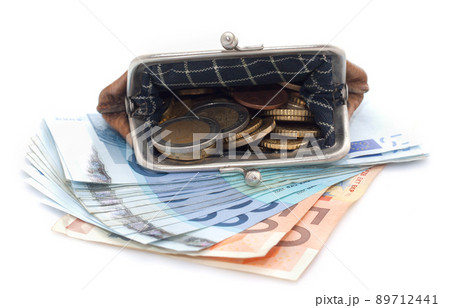 Wallet with euro coins and banknotes on white background Wallet with euro coins and banknotes on white background 89712441