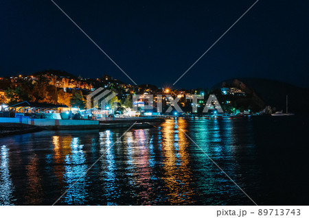 Night landscape of the resort village of Gurzuf in Crimea with a view of the beach and mountains 89713743