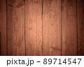 Old wooden red, brown background of boards with cracked and peeling paint. Wooden texture. Fence 89714547