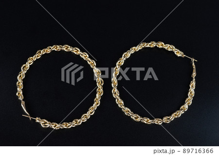 Jewelry earrings and costume jewelry on a black background 89716366