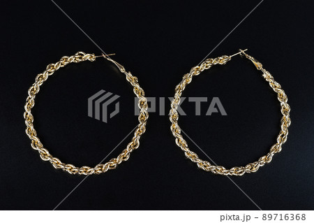 Jewelry earrings and costume jewelry on a black background 89716368