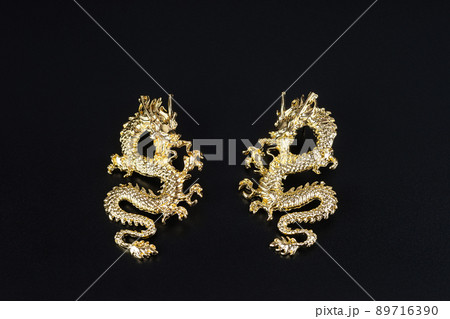 Jewelry earrings and costume jewelry on a black background Jewelry earrings and costume jewelry on a black background 89716390