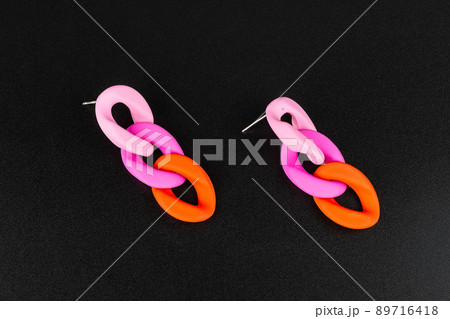 Jewelry earrings and costume jewelry on a black background Jewelry earrings and costume jewelry on a black background 89716418