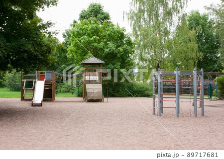 Children's playground with slide, climbing frame and rocking Children's playground with slide, climbing frame and rocking 89717681