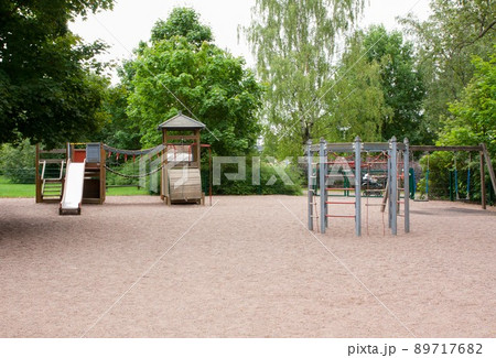 Children's playground with slide, climbing frame and rocking Children's playground with slide, climbing frame and rocking 89717682