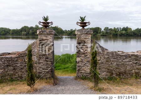 old stone gates and palace flower pots, European Garden overlooking the river 89718433