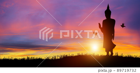 Silhouette of Buddha mediating in the twilight with sunrise background. Magha Puja, Asanha Puja, and Visakha Puja Day. Buddhist holiday Concept. 89719732
