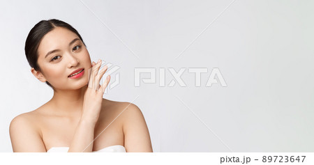 Beautiful asian woman makeup of cosmetic, girl hand touch cheek and smile, face of beauty perfect with wellness isolated on white background. Beautiful asian woman makeup of cosmetic, girl hand touch cheek and smile, face of beauty perfect with wellness isolated on white background. 89723647