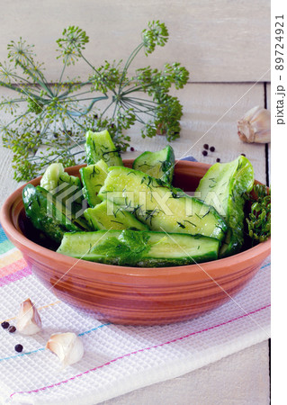 Fresh pickled cucumbers with dill and garlic 89724921