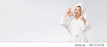 Asian woman being happy with the shower. Studio concept Asian woman being happy with the shower. Studio concept 89725476