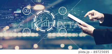 Content marketing concept with businessman using a tablet 89725695