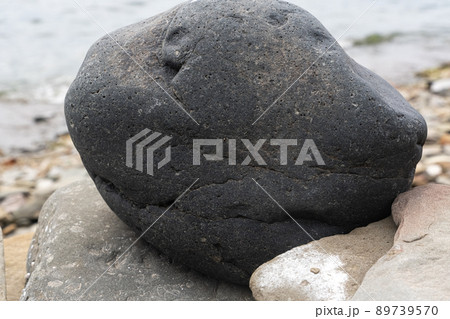 Large dark gray sea stone Large dark gray sea stone 89739570