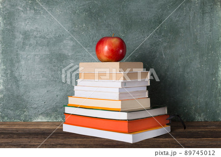 Stack of books and stationery 89745012