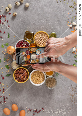 woman photographs the ingredients of the diet woman photographs the ingredients of the diet 89745020
