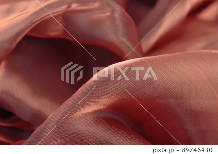 The texture of the fabric is close-up brown. 89746430
