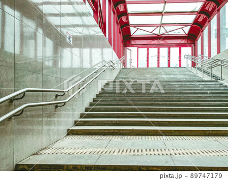 underground pedestrian crossing. safety of people on the road with cars. closed passage for the movement of people. high concrete stairs, comfortable metal railings underground pedestrian crossing. safety of people on the road with cars. closed passage for the movement of people. high concrete stairs, comfortable metal railings 89747179