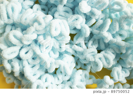 Soft yarn, delicate blue yarn. Handmade knitting as a hobby. 89750052