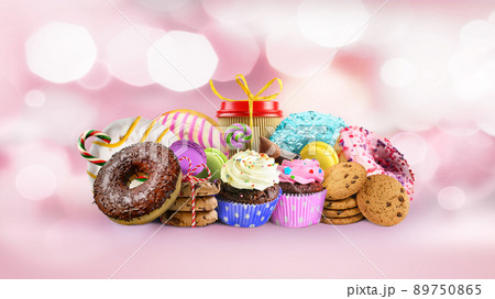 Group of Various confectionery on a pink blurred background Group of Various confectionery on a pink blurred background 89750865