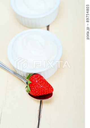 organic Greek yogurt and strawberry organic Greek yogurt and strawberry 89754803